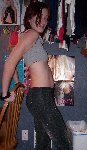 Photo shoot shiny black pants leaning on chair 1-13-05.jpg