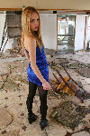 teen assessing tornado damage2-L.jpg