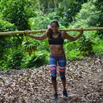 Hahaha Only a tahitian vahine trains with a flower on her ear...note the simpler ways of<br />island life-this photo is of a different gal<br />living in tahiti
