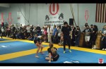 this is from a little more left so you now see most of the people watching and i point out with arrows those wearing masks....note there is NO social distancing as well.....I know donald trump gets accused of the superspreader rallies....well if this is happening in an indiana jiujitsu facility.....now you know why the virus is exploding again.